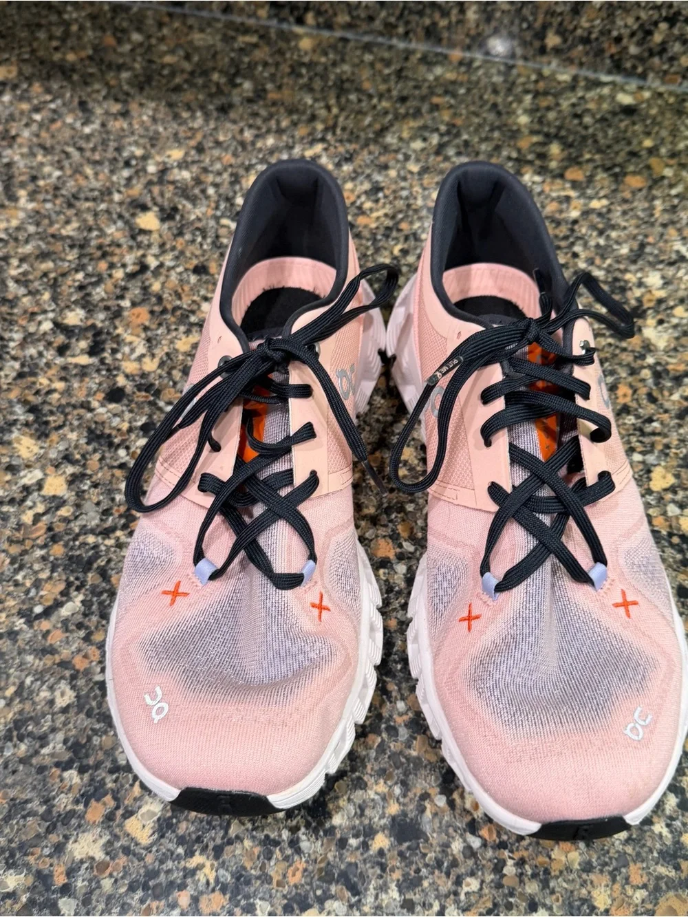 On Cloud Running Shoes in white with Orange Accent ladies 9